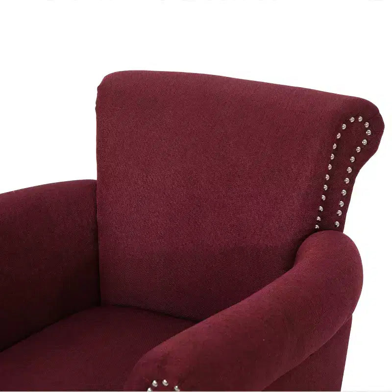 Fauteuil club contemporain en tissu Brice avec garniture cloutée