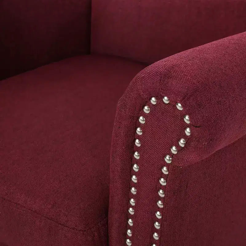 Fauteuil club contemporain en tissu Brice avec garniture cloutée
