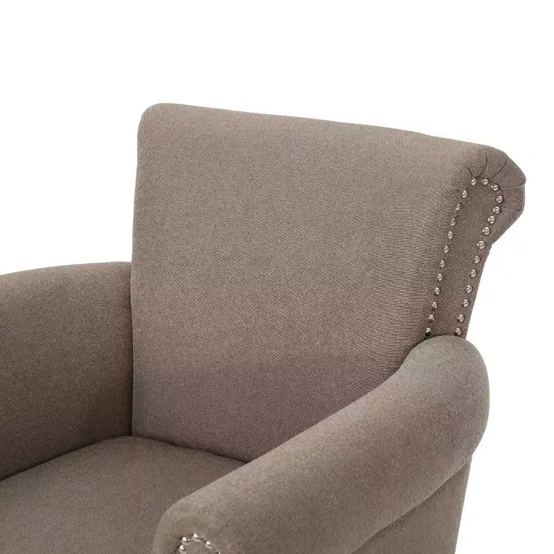 Fauteuil club contemporain en tissu Brice avec garniture cloutée